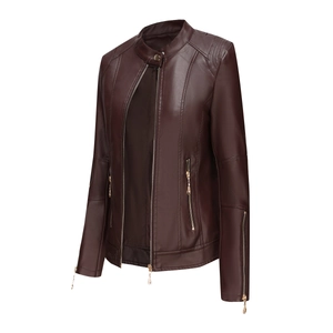 Detail of burgundy leather jacket with gold zippers and quilted shoulder stitching