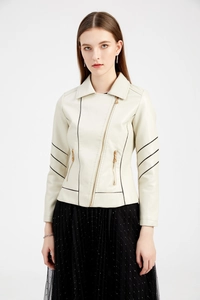 Close-up of the asymmetric metal zipper and lapel details on a cream faux leather jacket