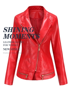 Detail of red slim fit faux leather jacket featuring metal zippers and notch lapels