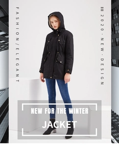 Close-up of a black hooded parka coat featuring warm fleece lining and a drawstring waist