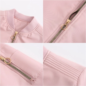 Close-up of pink bomber jacket showing gold zipper detail and ribbed baseball collar