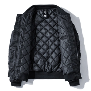 Men's black quilted bomber jacket with diamond lattice lining and ribbed collar in size M
