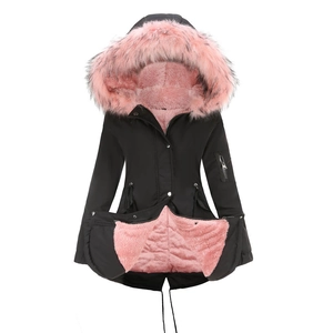 Women's black parka with pink faux fur lining and drawstring waist in a front view