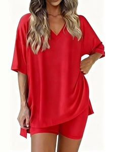 Women's two-piece lounge set with red V-neck short sleeve top and cycling shorts