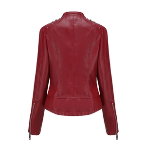 Detail of burgundy biker jacket back featuring shoulder studs and cuff zippers