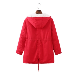 Detail of red hooded parka for women featuring warm fleece lining and waist drawstrings