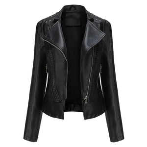 Detailed view of silver metallic studs on lapel and quilted patterns on black leather jacket
