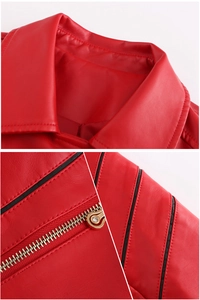 Detailed macro view of red PU jacket showing lapel collar and silver metal zippers