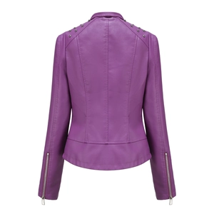 Detail view of purple biker jacket back featuring studded shoulders and cuff zippers