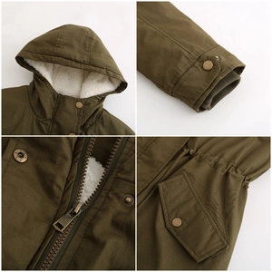 Detail of army green parka with fleece lining, metal buttons and windproof ribbed cuffs