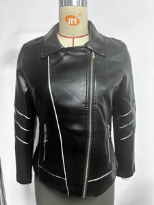 Detail view of black faux leather biker jacket with white contrast trim and stripes