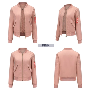 Detailed views of pink bomber jacket showing quilted lining and red zipper tag detail