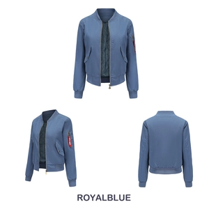 Detail of royal blue MA-1 flight jacket showing quilted lining and utility sleeve pocket