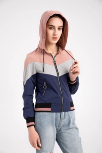 Detail of hooded windbreaker featuring tricolor splicing design and metal ring zipper
