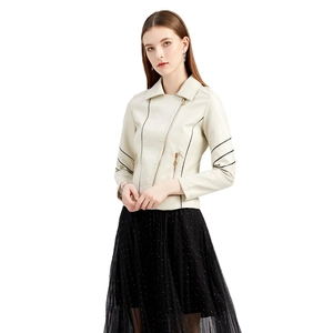 Women's chic beige PU leather motorcycle jacket styled with black polka dot mesh skirt