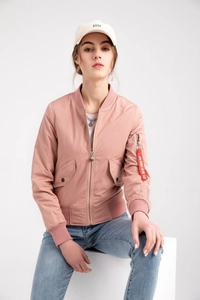 Detail of pink bomber jacket with signature red ribbon on sleeve pocket utility zip