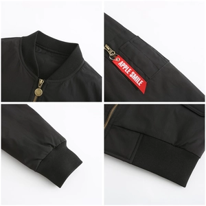 Detail shots of ribbed collar, zip pocket, cuffs and hem on black bomber jacket