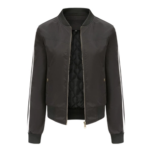 Detail of black bomber jacket with diamond quilted lining and gold metal zipper