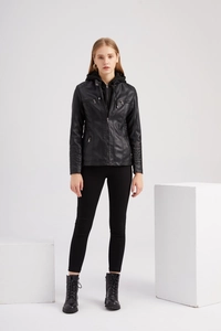 Detail of hooded black PU leather jacket featuring quilted shoulder pads and metallic zippers