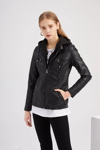 Detail of hooded faux leather jacket with metal zippers and pleated sleeve texture