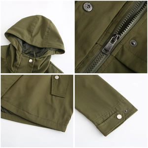 Detail view of army green hooded jacket with metal zipper, snaps and adjustable cuffs