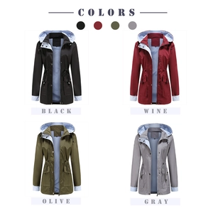Detail view of hooded windbreaker colors with drawstring waist and striped lining accents