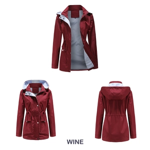 Three views of a wine red hooded trench coat with striped lining and drawstring waist