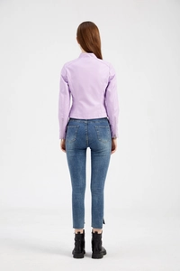 Back view of a slim lavender faux leather jacket with stand collar and zipper details