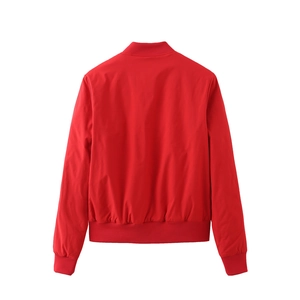Detailed back view of a red padded bomber jacket featuring ribbed hem and smooth fabric