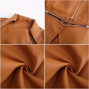Detail view of brown PU leather jacket featuring lapels and silver metal zipper texture