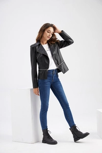 Detail view of black slim fit biker leather jacket with asymmetric zipper and metal rivets