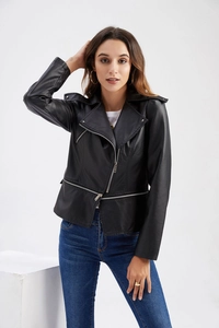 Detail of a black leather biker jacket with asymmetric zipper and lapel collar details
