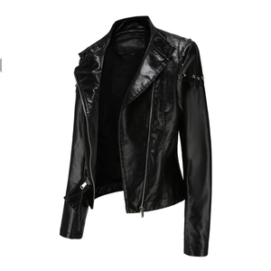 Close-up of silver studs on the shoulder of a black faux leather motorcycle jacket