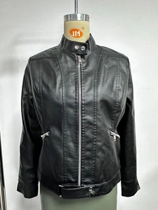 Detail of black faux leather jacket with stand collar, metal zipper, and quilted stitching