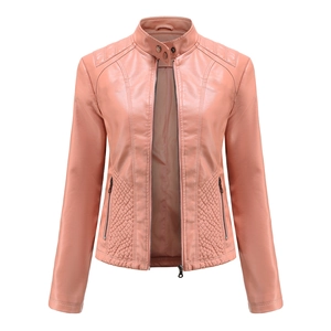 Detail of pink faux leather biker jacket with diamond quilting on shoulders and waist