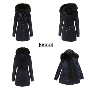 Detail view of navy blue hooded parka featuring thick faux fur collar and warm fleece lining