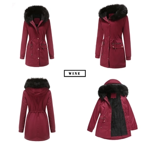 Detail view of wine red parka with black faux fur hood and warm fleece lining