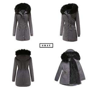 Detail view of grey winter parka with black faux fur hood and warm fleece lining