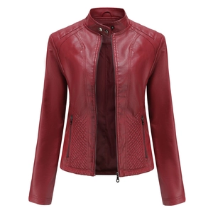 Detail of burgundy biker jacket featuring snap collar and quilted diamond stitching