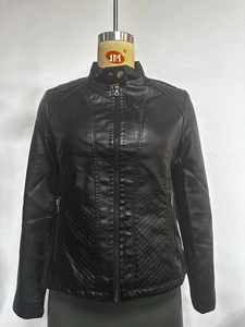 Close-up of black PU leather biker jacket featuring quilted pattern and stand collar