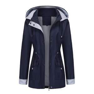 Detail of dark blue waterproof jacket with striped lining and adjustable drawstring waist