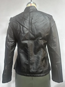 Detail view of the black PU leather jacket back featuring seam lines and zipper cuffs