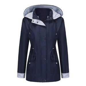 Detail of navy blue hooded trench coat featuring waist drawstring and striped lining cuffs