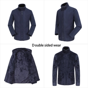 Detail of blue double-sided fleece jacket showing smooth and fluffy textures
