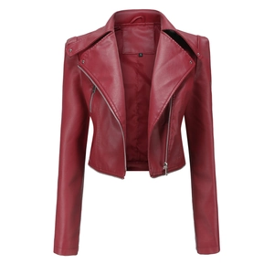 Macro detail of deep red PU leather jacket showing lapel collar and size S tag