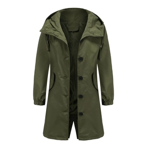 Detailed view of the water-resistant hood with adjustable drawstrings on a green windbreaker
