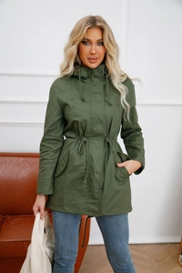 Detail of army green cotton parka showing the drawstring waist and metal zipper hardware