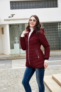 Women's slim fit mid-length hooded down jacket in deep wine red with zipper pockets