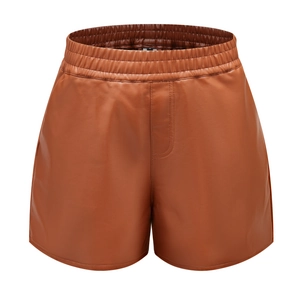 Detailed view of high waisted brown PU leather shorts with wide elastic waistband