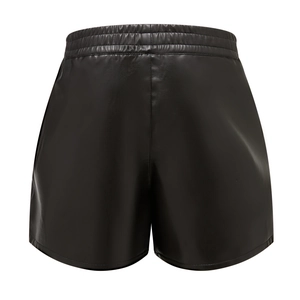 Close-up of black PU leather shorts featuring a wide elastic waistband and matte texture